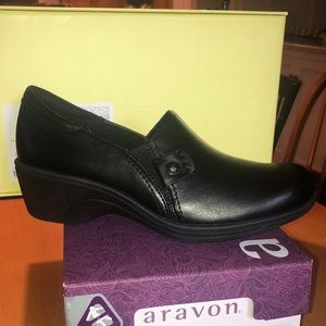 Black womens slip resistant leather shoe.
